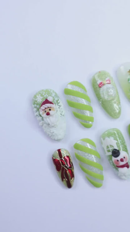 Festive Green Medium Almond Press-On Nails: Adorned with Santa Claus, Snowman Designs - Perfect for Christmas Day or Gift for Her